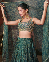 Designer lehenga on banglori silk blouse and pure organza silk with detailed embroidery